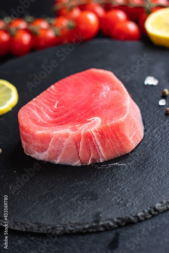 tuna fish raw seafood ready to eat meal copy space food background rustic. top view diet pescetarian vegetarian food