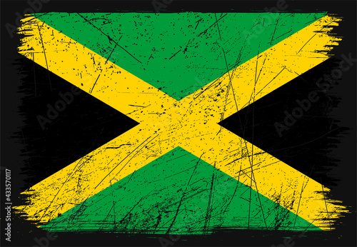 Creative grunge flag of Jamaica country. Happy independence day of Jamaica. Brush flag on shiny black background