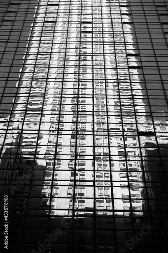 Building reflection in windows of another building in New York, USA