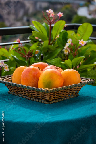 Fototapeta Naklejka Na Ścianę i Meble -  A basket full of fresh mango