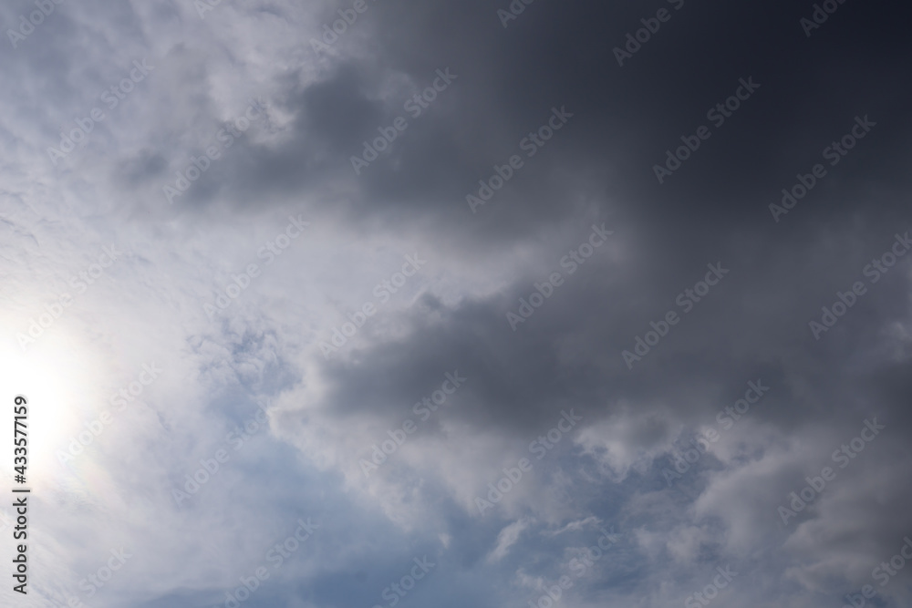 Gray-black clouds are floating over the sky.
