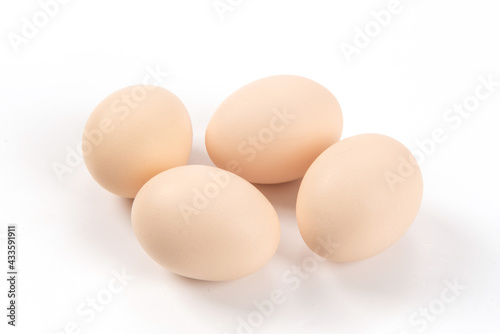 Raw native chicken eggs on white background