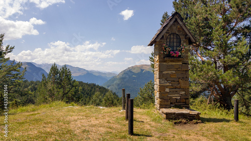 Oratorio situado en la Balsa de Arres, Valle de Arán, con vistas a la sierra pirenaica. photo