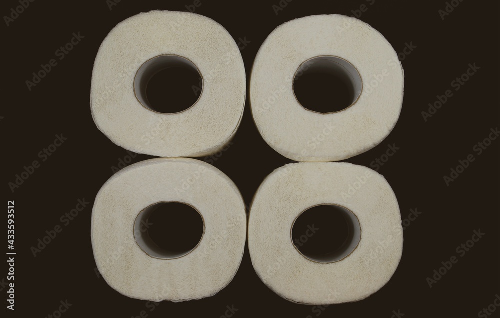 Four rolls of toilet paper. Top view. Toilet paper square Four rolls of toilet paper. Top view. Toilet paper square