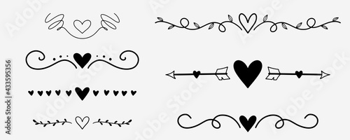 Handwritten love doodle. Decorative romantic dividers. Hand drawn romantic doodles with heart shape and arrows. Wedding decoration in drawing style photo