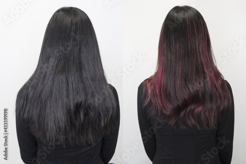 Rear view of dark hair with pink dye. Soft focus