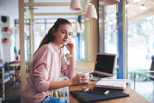 Free Download Glad woman holding cup of tasty coffee - GFXLoad