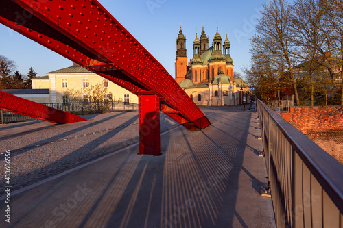 Bishop Jordan Bridge over Cybina River and Poznan Cathedral in sunny morning, Poznan, Poland.