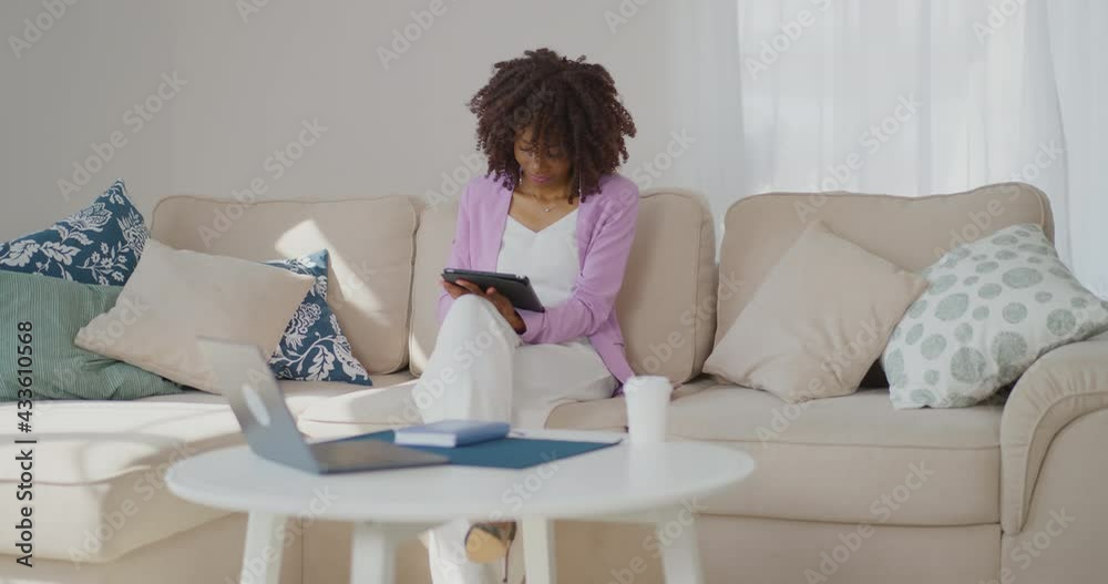 The businesswoman is working and resting at the computer The African American businesswoman Home office Coffee at work Workspace The businesswoman is working and resting at the computer The African American businesswoman Home office Coffee at work Workspace
