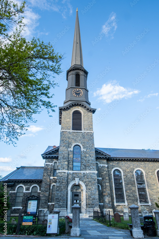 Kingston, NY - USA- May 12, 2021: The Old Dutch Church, a 19th-century bluestone church and cemetery located on Wall Street in the Kingston Stockade District.