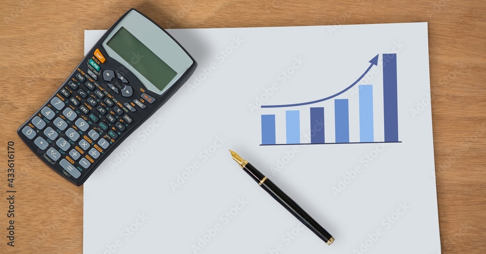 Composition of calculator and pen over paper diagram