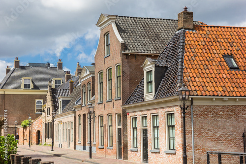 Old houses in a historic street in Assen, Netherlands photo