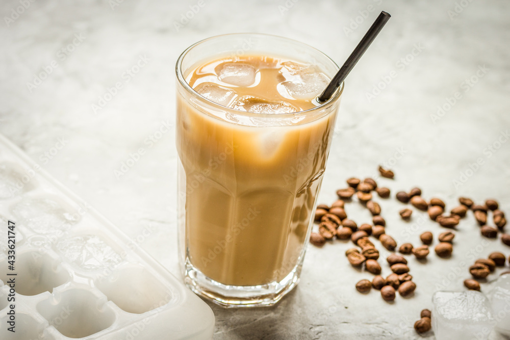 Ice coffee with milk and beans for lunch on stone background - obrazy, fototapety, plakaty 