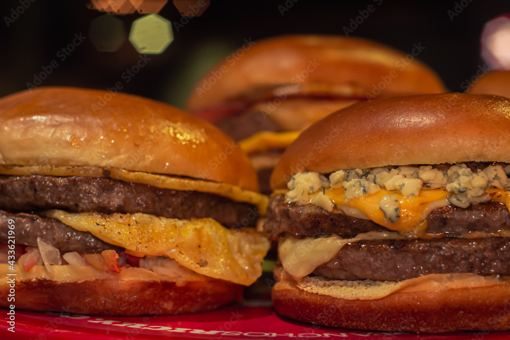 Delicious fresh home made Burguers with vegetables, Food advertising photography