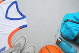 Flat lay composition with sports equipment on grey background, space for text