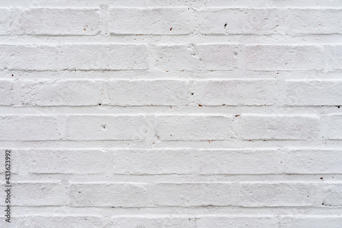 Rustic white painted brick wall texture background.