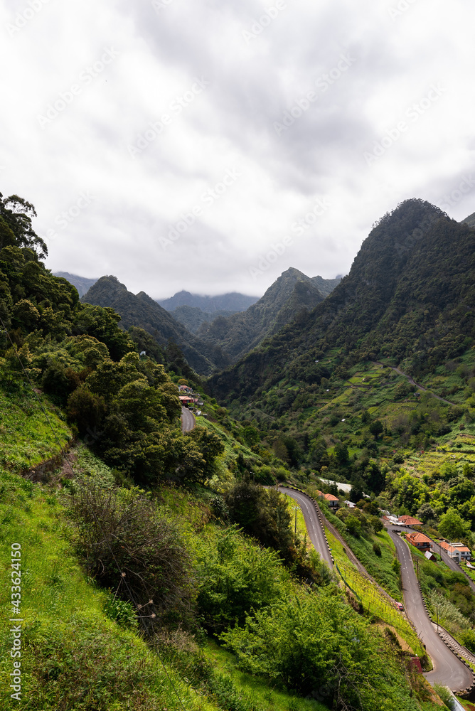 Naklejka premium Madeira island valley viewpoint on tropical landscape