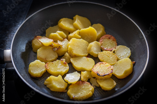 fried potatoes in a hot pan