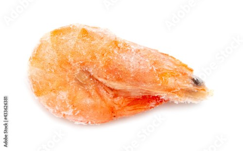 Frozen red shrimp on a white plate.