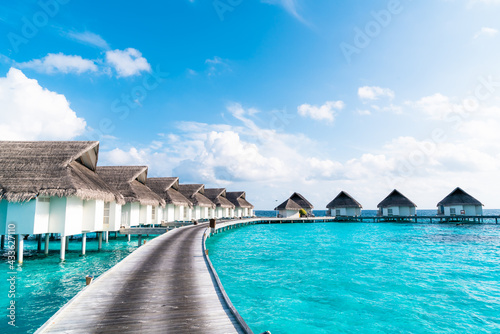 tropical Maldives resort hotel and island with beach and sea for holiday vacation concept © topntp