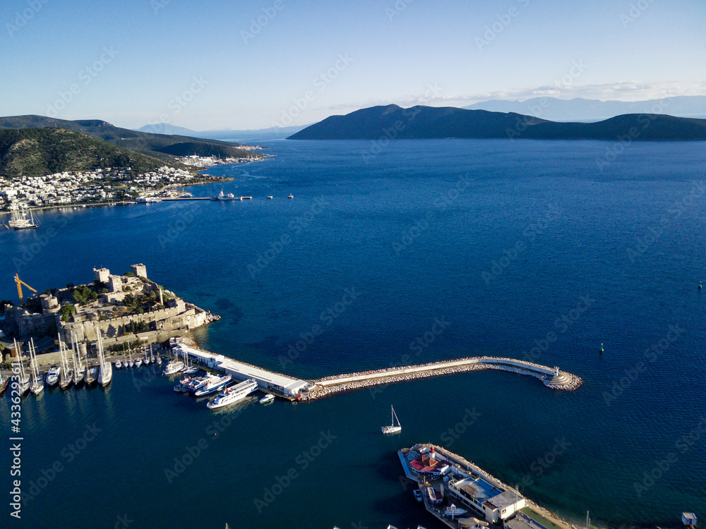 Amazing panoramic view from drone of Bodrum harbour and ancient Kalesi castle in Turkey