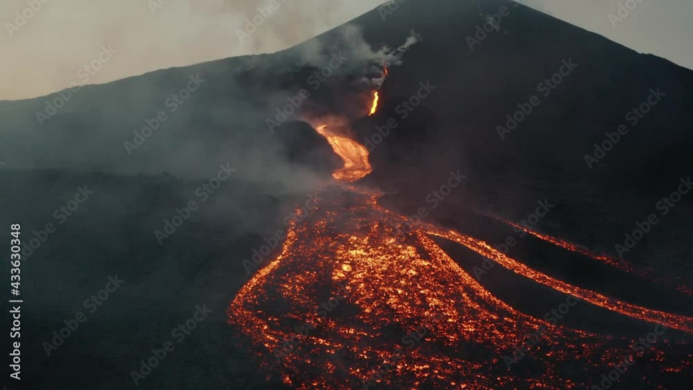 Lava from active erupting Pacaya volcano in Guatemala. Drone aerial sunrise shot