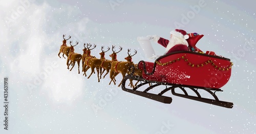 Composition of santa claus in sleigh pulled by reindeer over snow falling and clouds background
