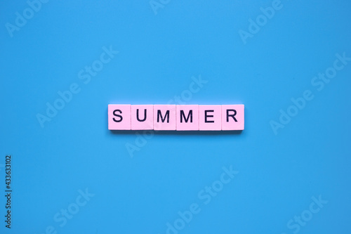 Summer word on a blue background.