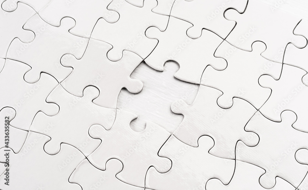 Close up view of unfinished jigsaw puzzle Close up view of unfinished jigsaw puzzle