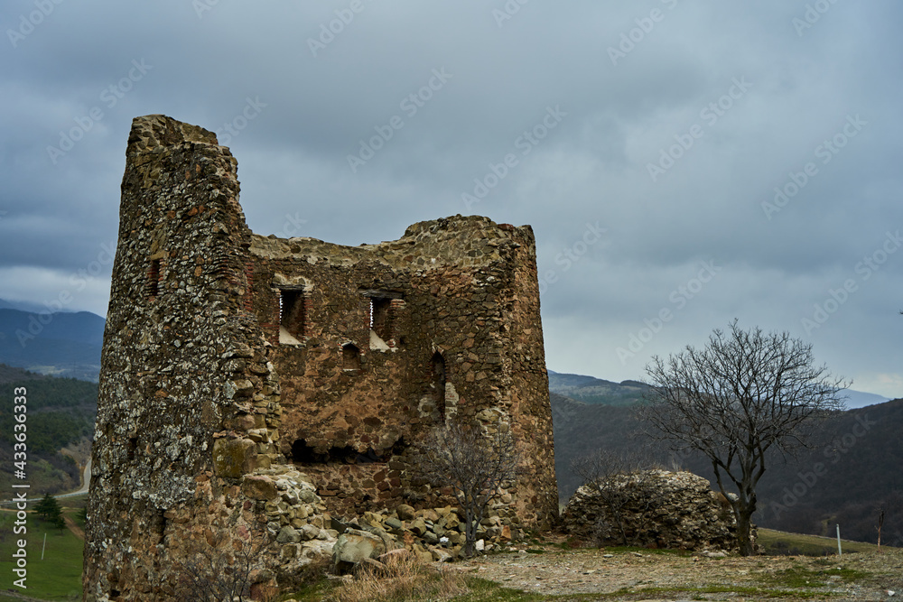 An old stone fortress in the mountains