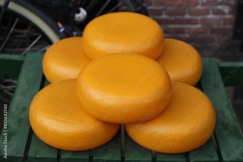 The characteristic yellow-colored round shapes of Dutch cheese