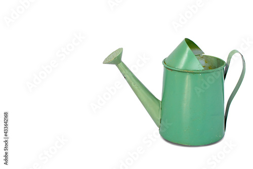 Empty decorative green metal watering can zinc coated with one handle cup isolated on white background. Metallic watering-can use container water to plant a flower in garden. concept of gadening tool