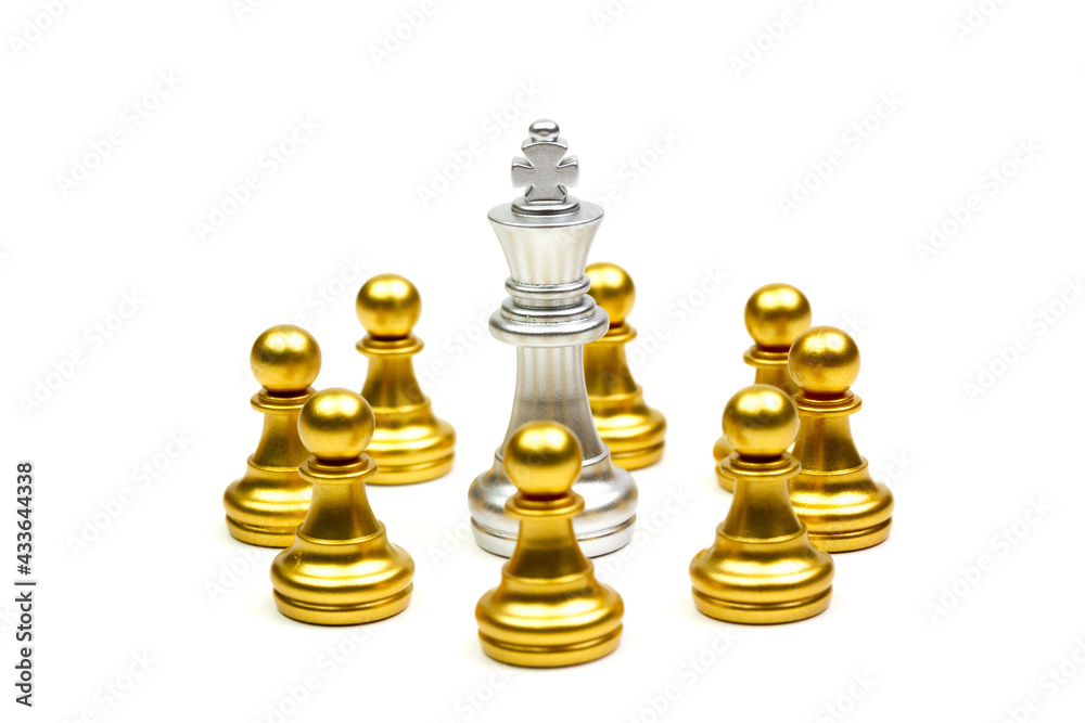 King silver chess pieces fall into the cordon of gold pawn isolated on white background. King silver chess pieces fall into the cordon of gold pawn isolated on white background.