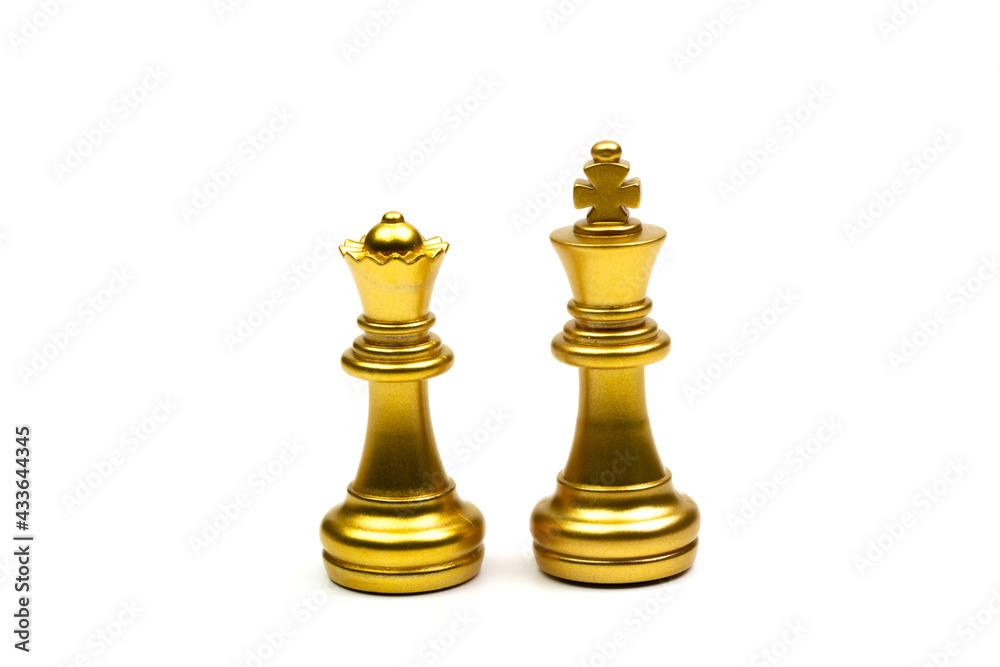 King and queen chess pieces gold isolated on white background. King and queen chess pieces gold isolated on white background.