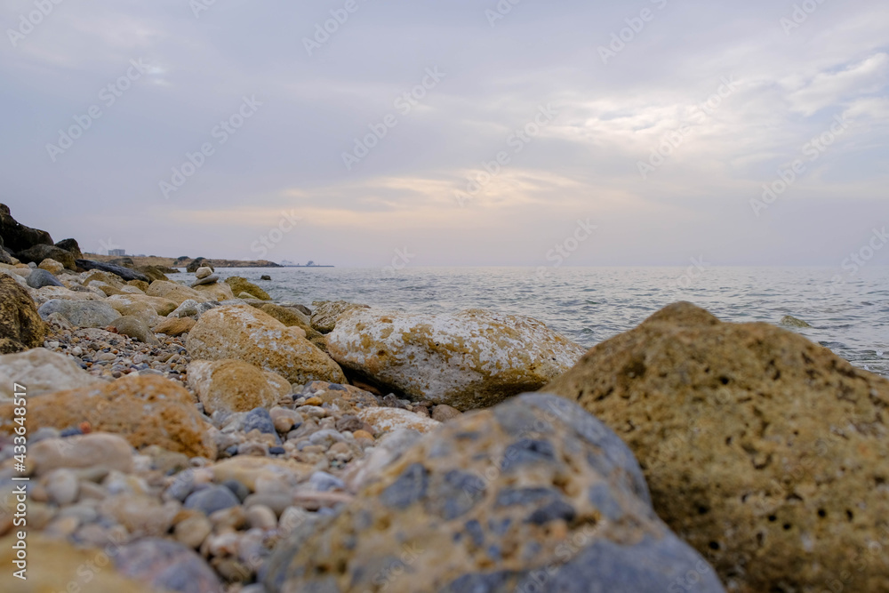 Magical sunset background natural colours crashing wave Cyprus landscape beach sea stone . High quality photo