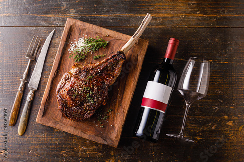 Grilled Tomahawk Steak and bottle of wine