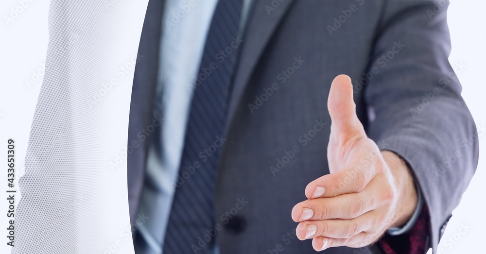 Mid section of businessman approaching for a hands shake against grey technology background Mid section of businessman approaching for a hands shake against grey technology background