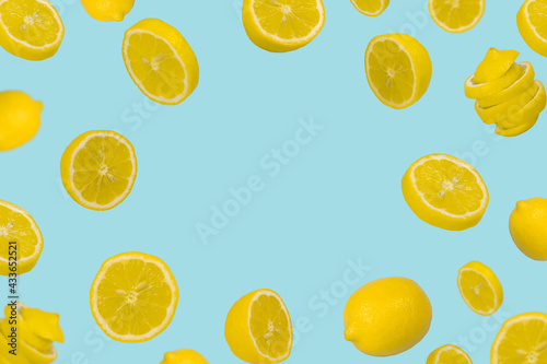 Floating levitating fresh lemon on pastel blue background. Vitamins, healthy diet concept. © Jovica Varga