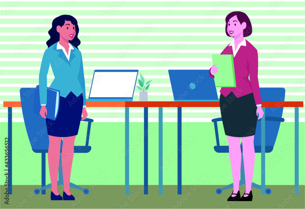 Two business women standing at the table and discussing business matters at meeting. Two women talking on business meeting. Two business women standing at the table and discussing business matters at meeting. Two women talking on business meeting.