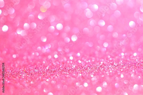 Abstract pink bokeh glitter on nature background