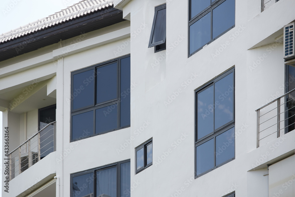 Black aluminum windows frame of modern building. facade of a building