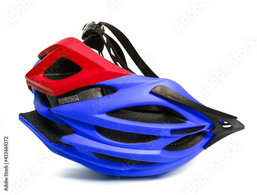 Blue and red helmet upside down isolated on white