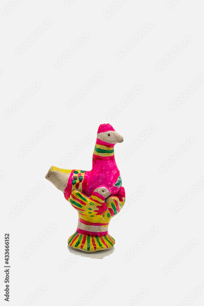 multicolored clay figurine of a chicken