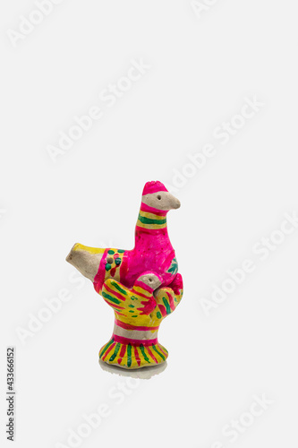 multicolored clay figurine of a chicken © MolOleg