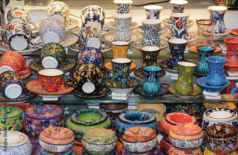 Bright and colourful selection of tea cups and other ceramics in the grand bazaar of Istanbul.