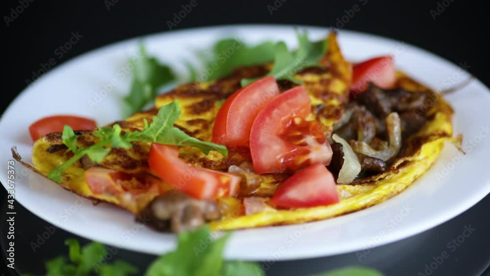 fried egg omelet with wild mushrooms and tomatoes fried egg omelet with wild mushrooms and tomatoes