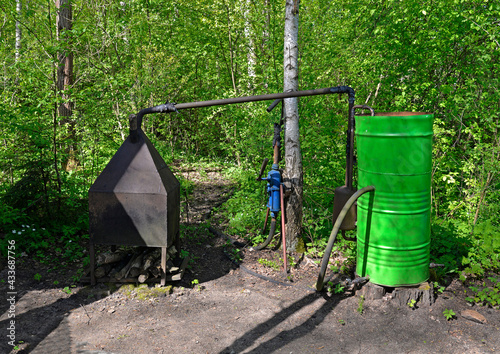 General view of self-made equipment for the preparation of various distillates. They are commonly made in Podlasie in Poland. The exhibition can be seen in the Podlasie village museum.