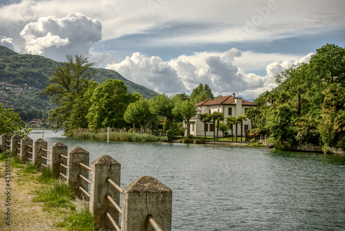 Lake Lugano at the narrow point between Lavena in Italy and Caslano in Switzerland  photo