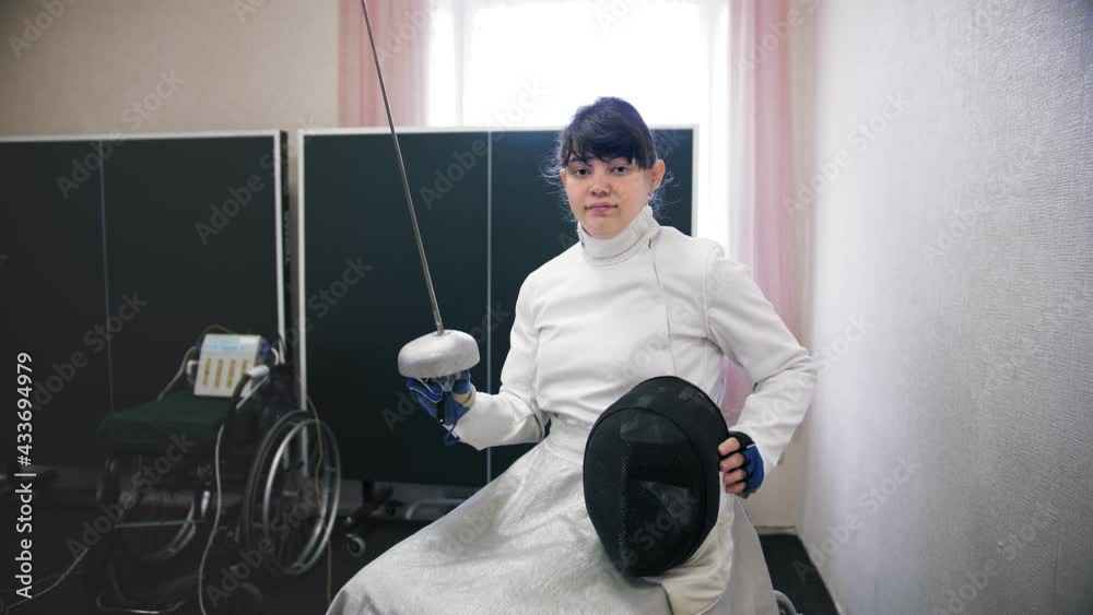 disabled athlete. fencing. paralympic games. wheelchair fencing