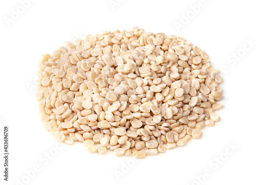handful of raw split black gram beans on white